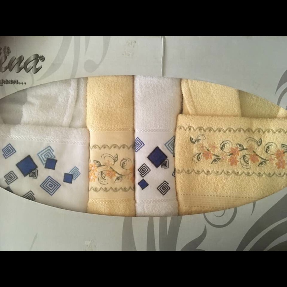 2 bathrobes 2 towels and 2 mini towels